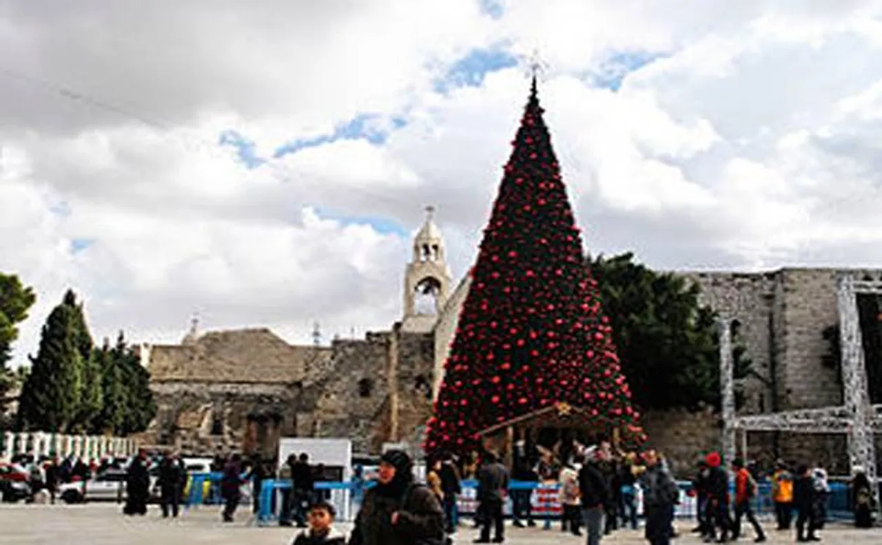Thousands of pilgrims celebrate Christmas in biblical town of Bethlehem