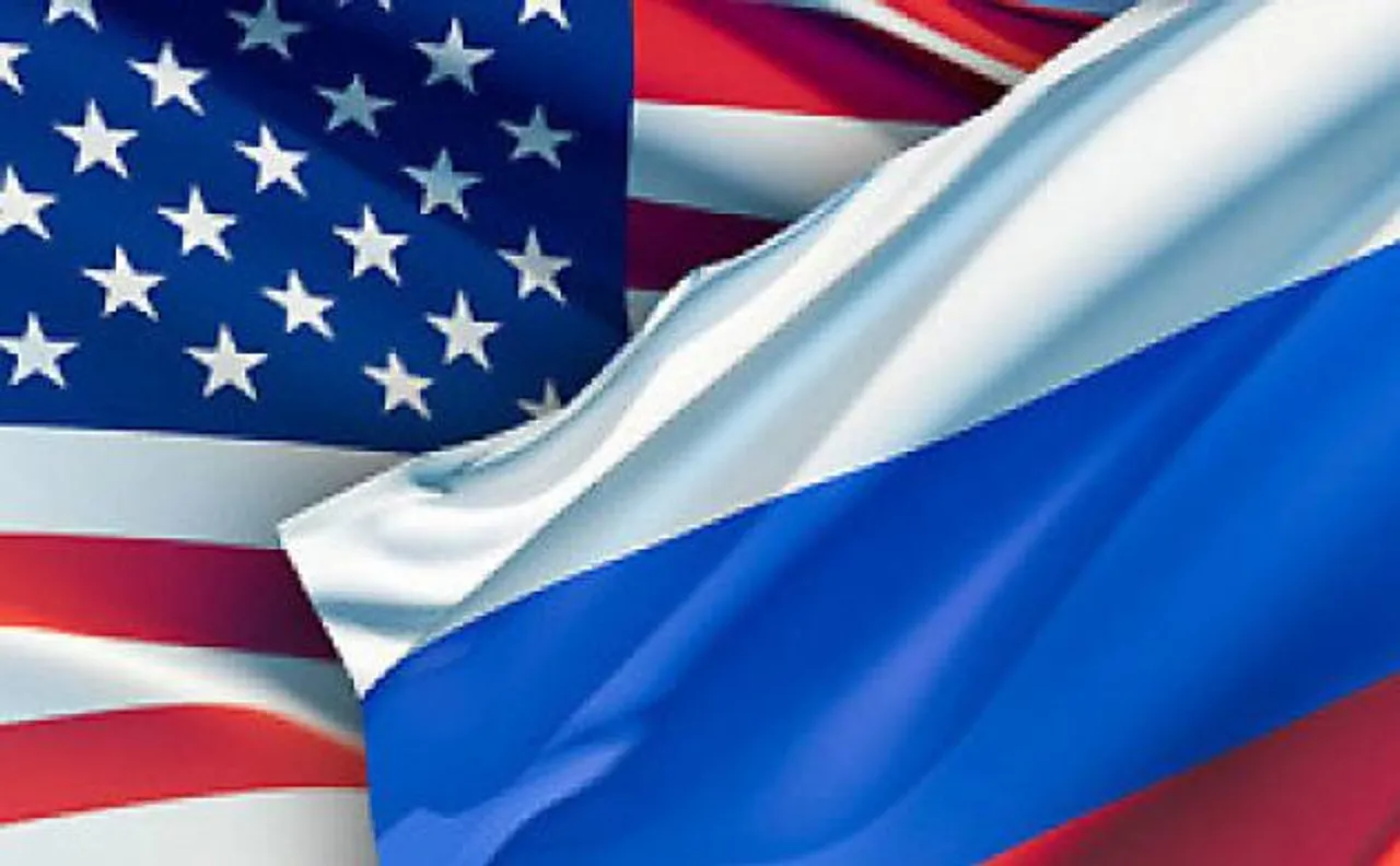 Russian diplomats expelled from US over meddling in presidential elections arrive in Moscow