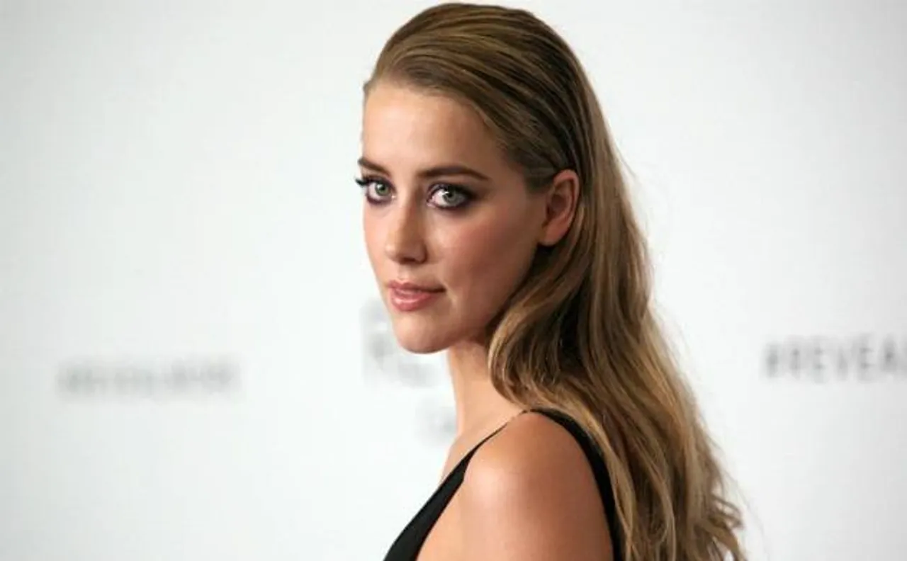 Johnny Depp claims Amber Heard tries to seek more fame through their divorce