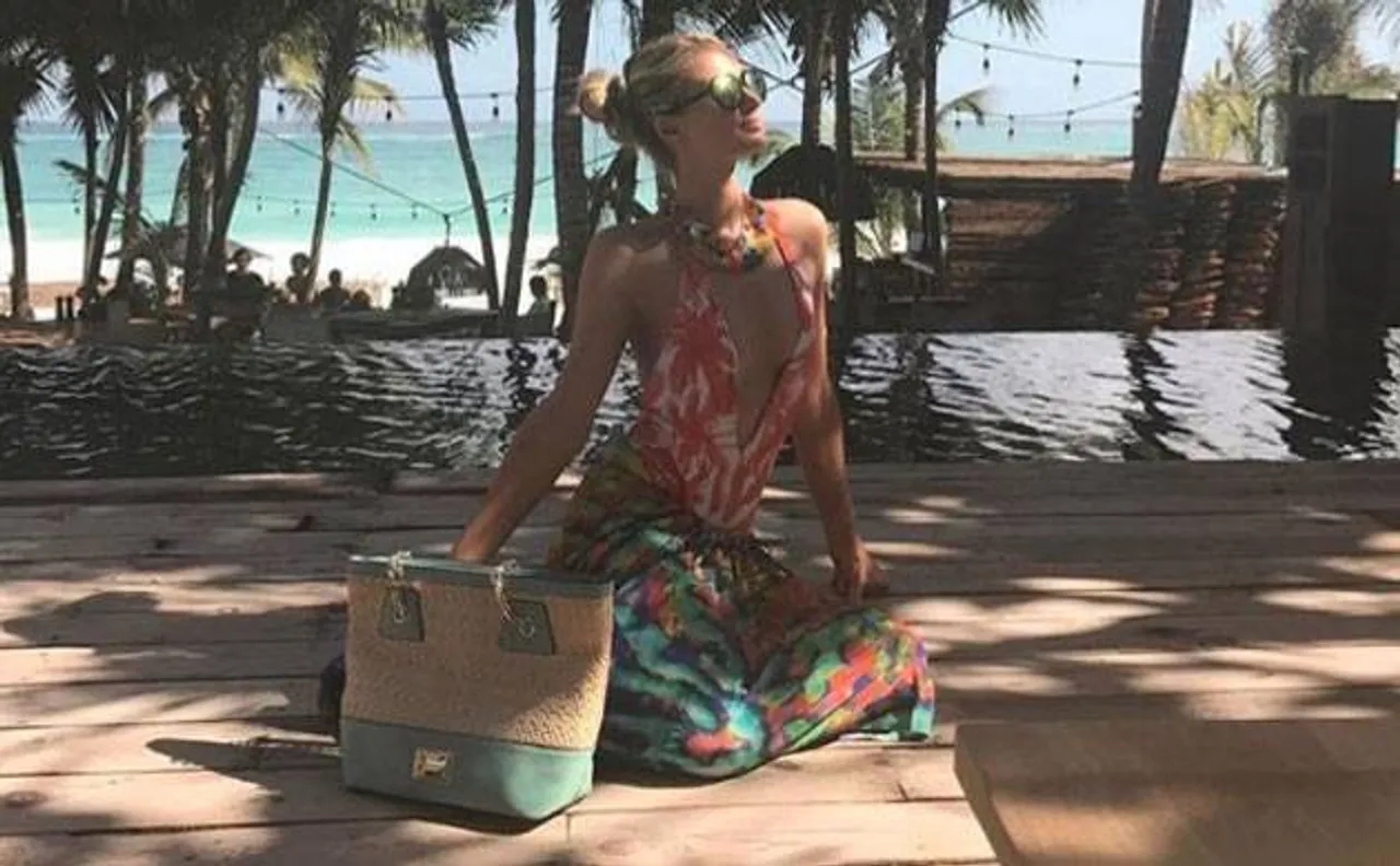 Ooppss! Paris Hilton suffers wardrobe malfunction during her beach date