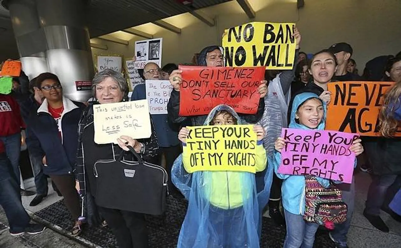 Trump's travel ban creates chaos at airports; outrage at protests across country