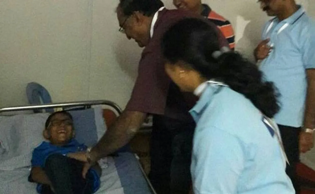 Boy receives first aid after Suresh Raina's six injures him at India vs England T20 match