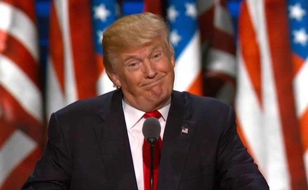 President Trump justifies his controversial immigration ban, says signed order to keep terrorists out