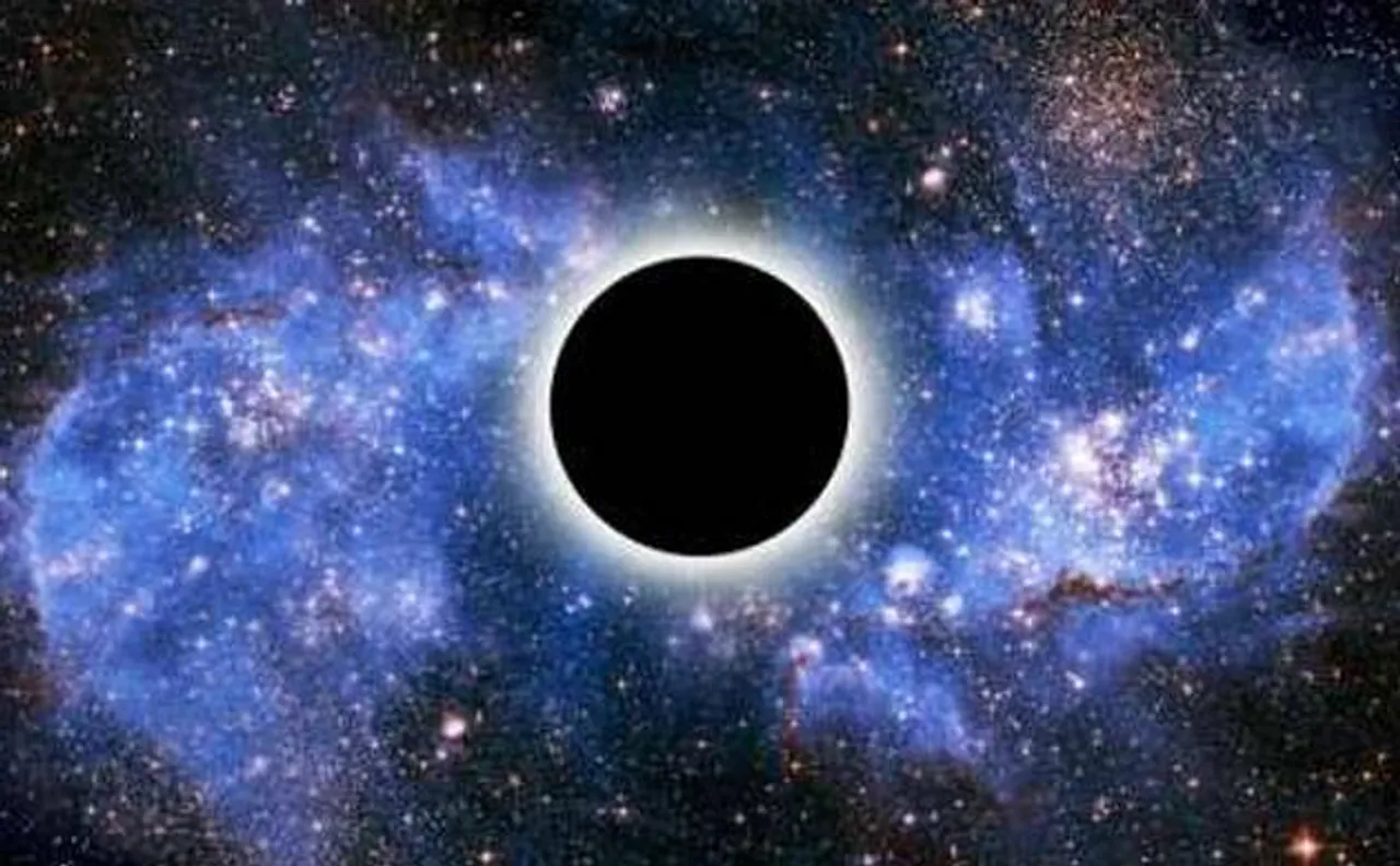 Massive black hole spotted binging on its remains for a decade