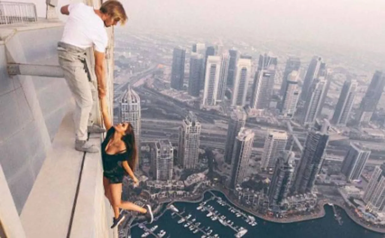 Dubai Police summons Russian model for dangling from 73-storey Cayan Tower