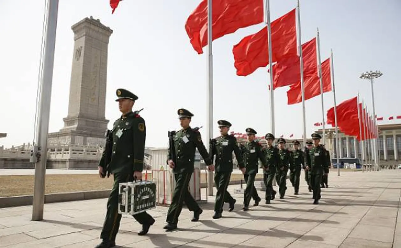 China to increase its defence spending by about 7% to guard against outside forces