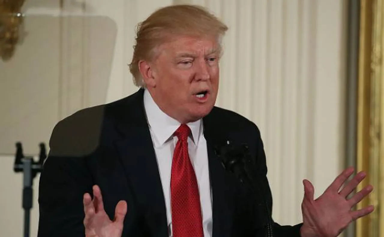 Federal judge in Hawaii extends his order blocking President Donald Trump's travel ban
