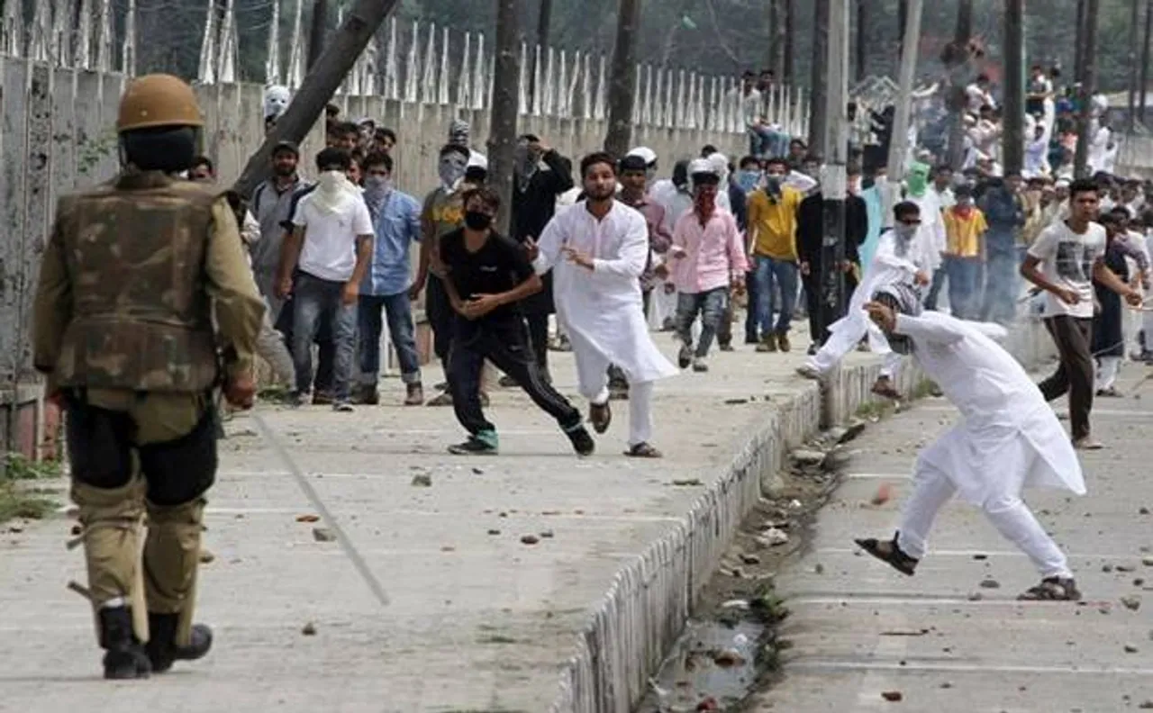 Clashes between protesters and security forces take place in Kashmir on Friday