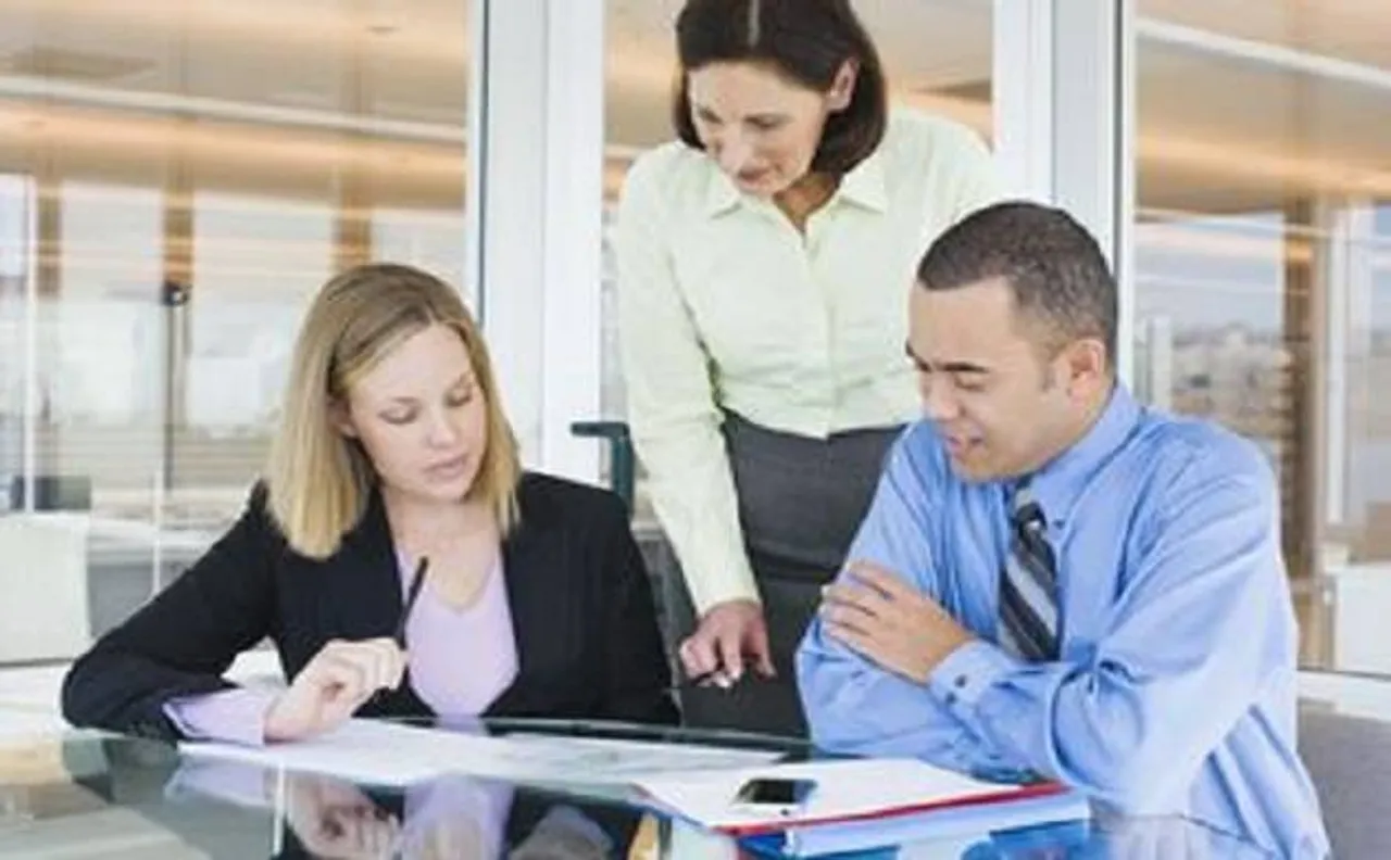 Helping co-workers may lead to unhealthy work environment, says study
