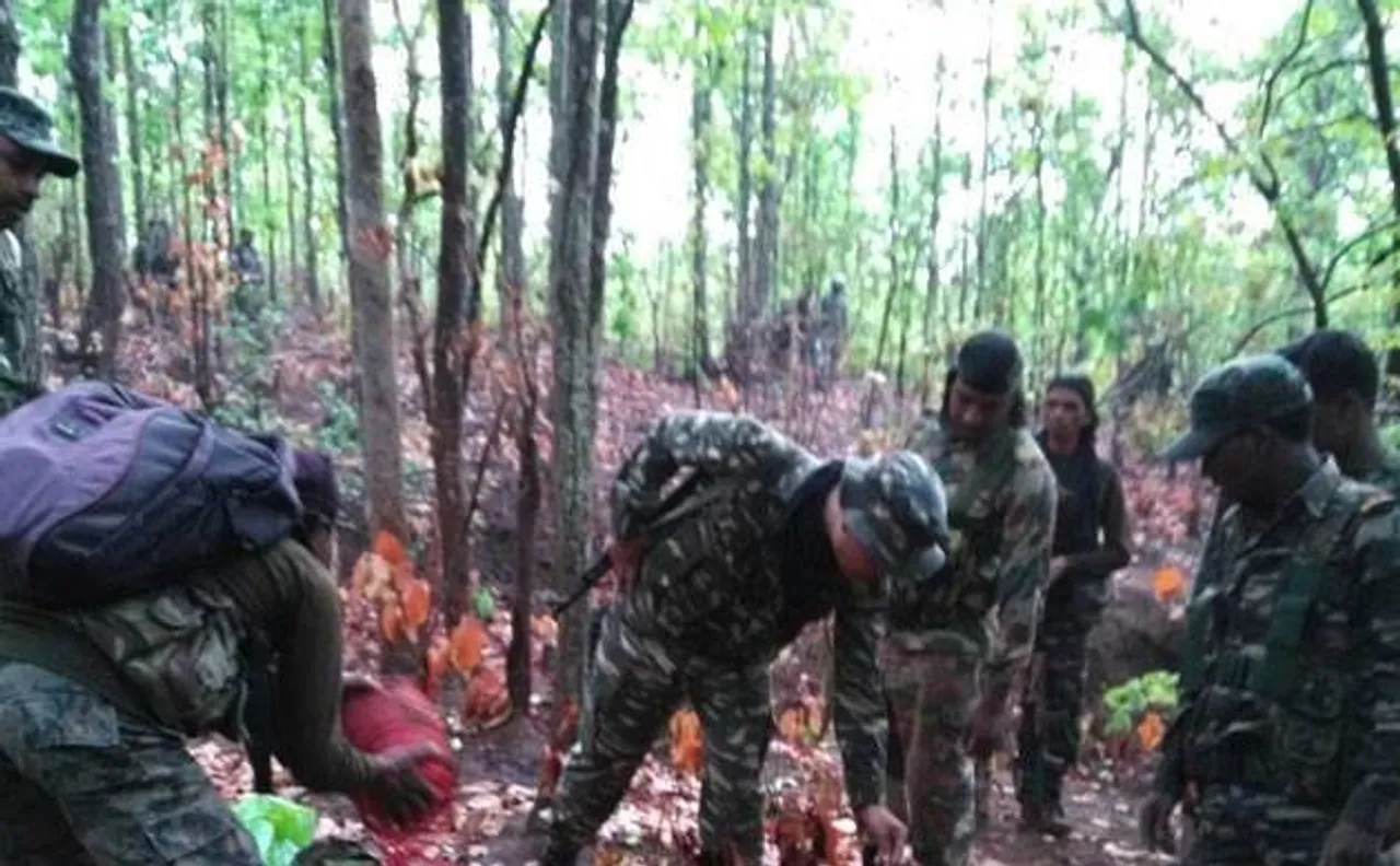 CRPF and Jharkhand police recover massive cache of arms and ammunition from Naxal hideout