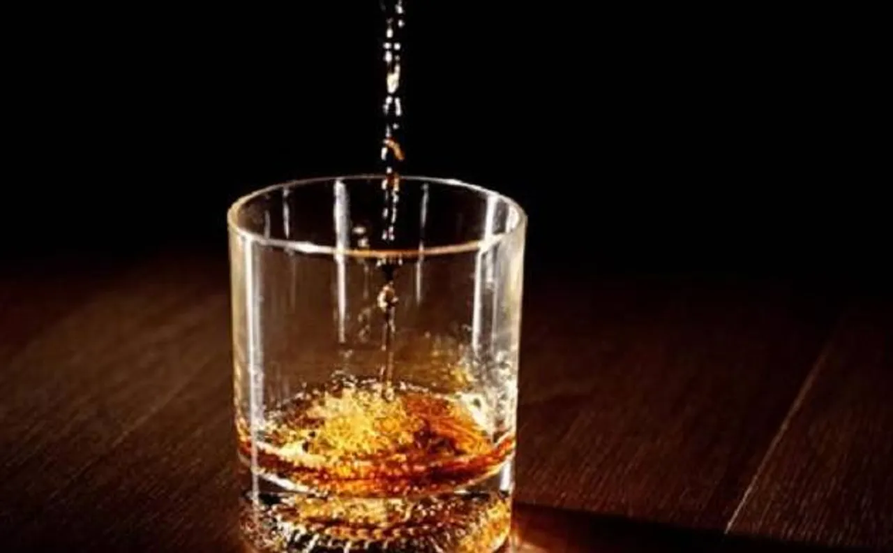 Ambulance carrying 40 cartons of liquor confiscated, two arrested
