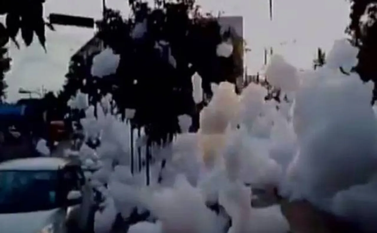 Watch | Bengaluru: Heavy rain causes toxic foams of Varthur Lake to spill on road; commuters witness tough times