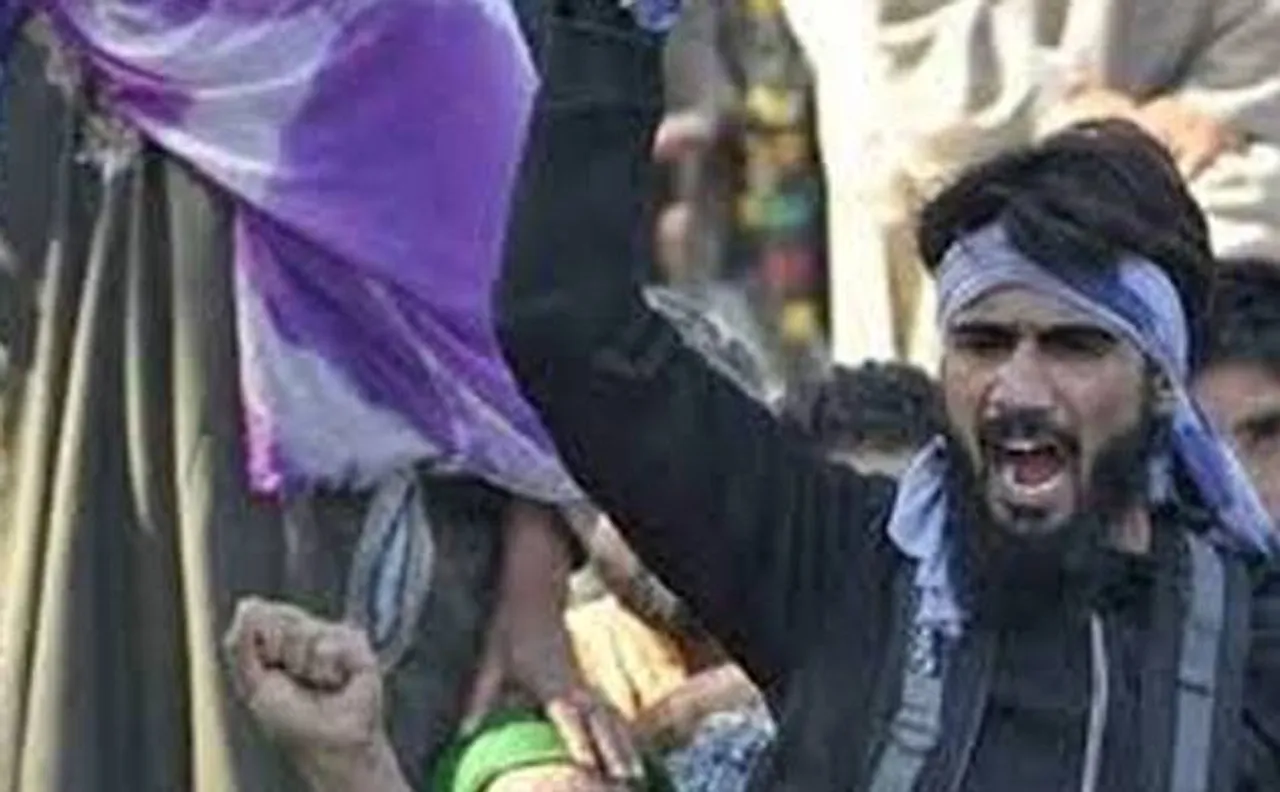 Suspected militant Danish Ahmed, seen at Sabzar Bhat's funeral, surrenders