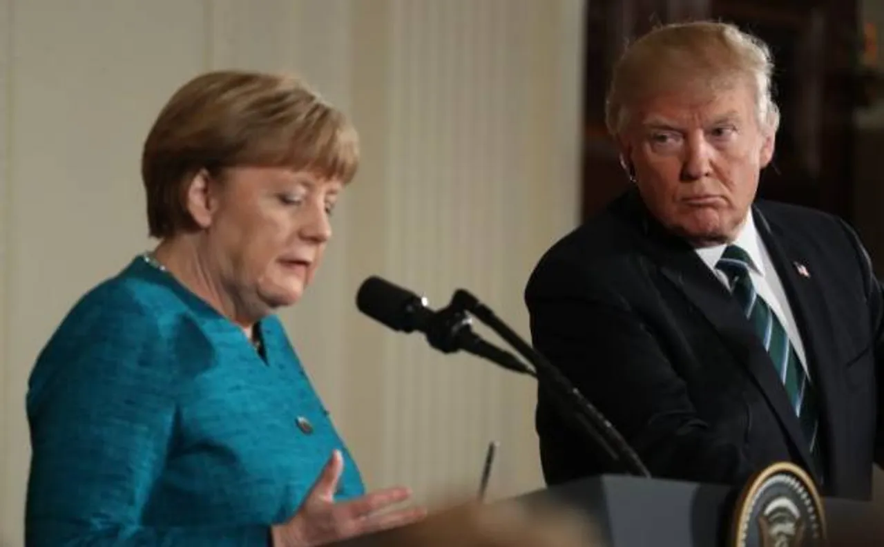 Trump isolated over climate sceptic stance, says G20 host Angela Merkel