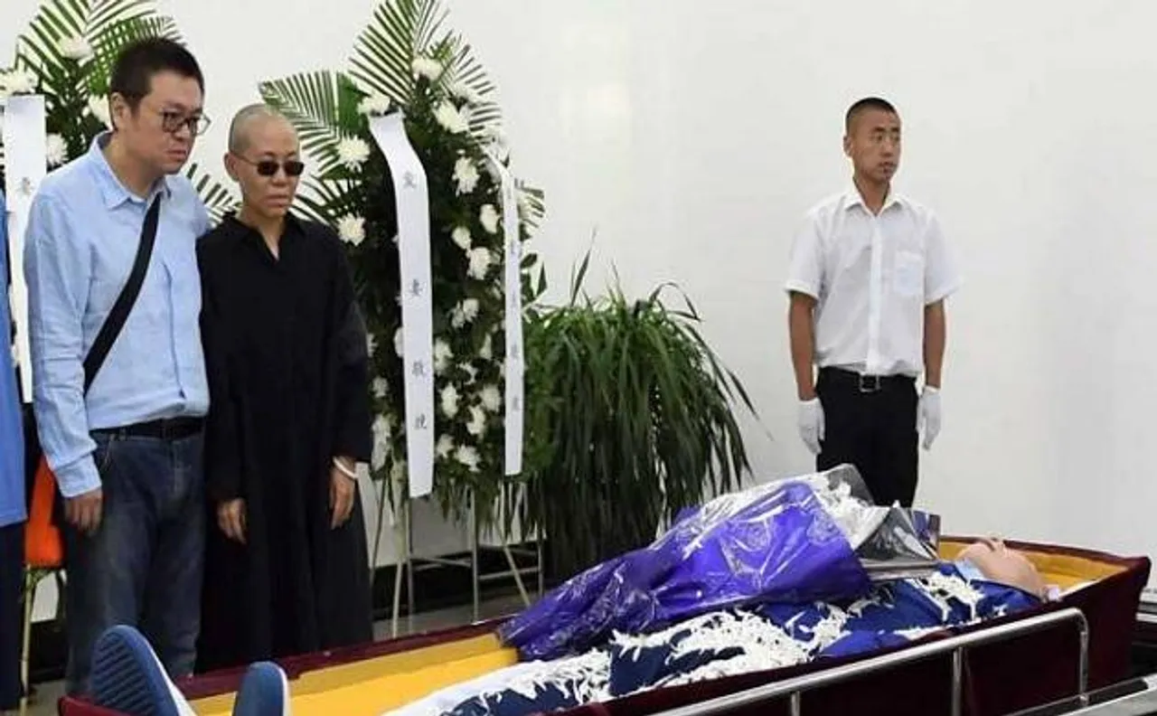 Nobel laureate Liu Xiaobo cremated; China says wife 'free so far'
