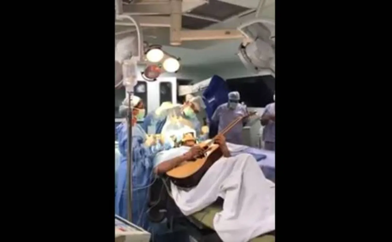 Musician's dystonia: Bengaluru techie strums guitar as surgeons drill into his brain | Watch Video