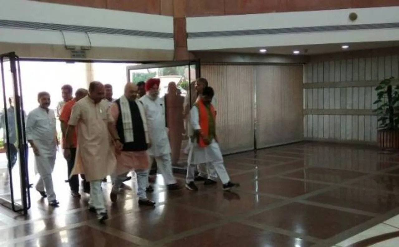BJP chief Amit Shah reprimands party MPs for absence from RS during passage of crucial bill