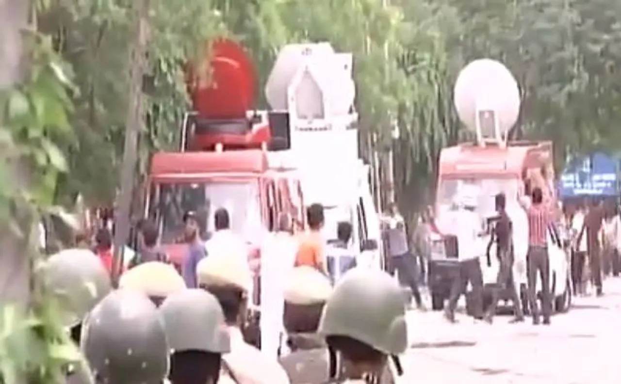 Ram Rahim supporters attack media vehicles after his conviction in rape case