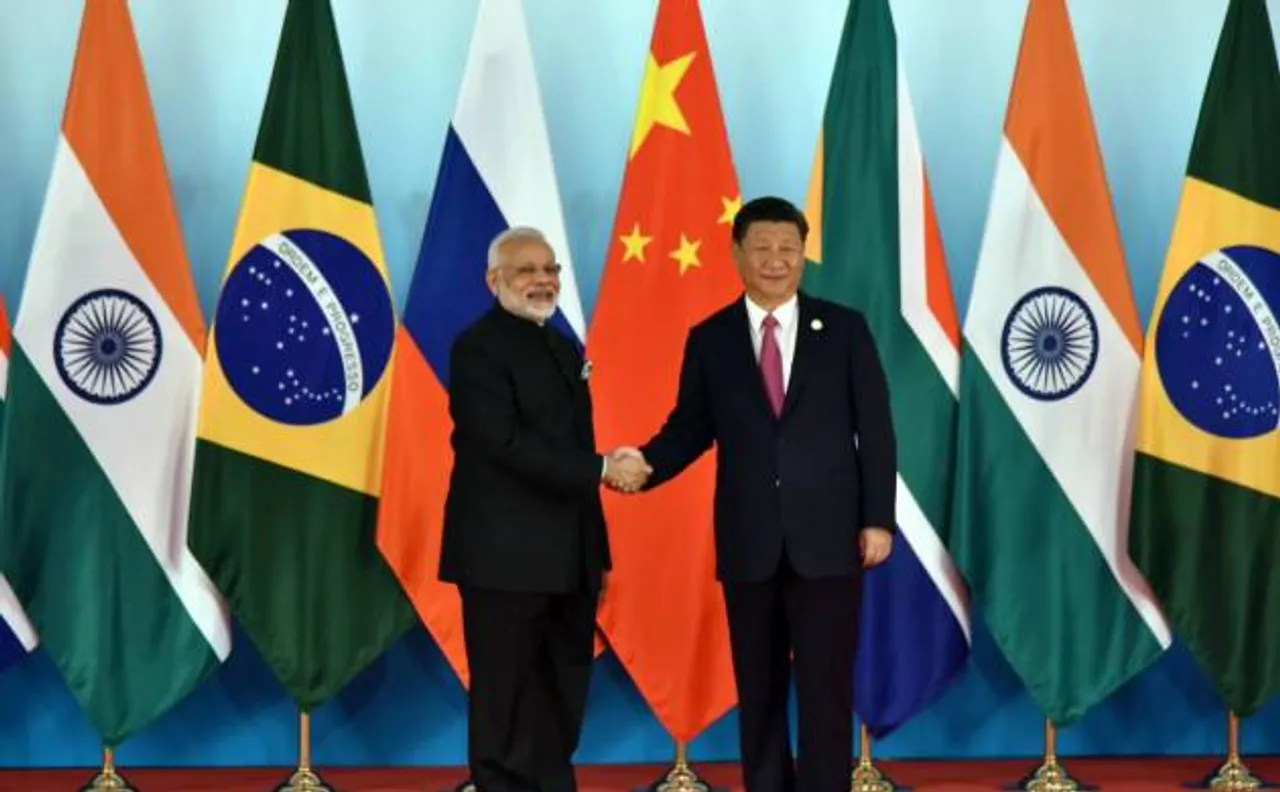 BRICS 2017: PM Modi, Chinese president Jinping display bonhomie on day 1 