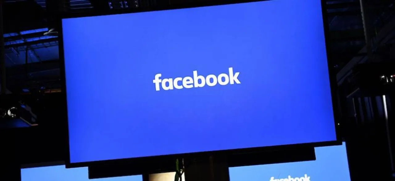 UK firm in Facebook row suspends CEO as lawmakers demand answers