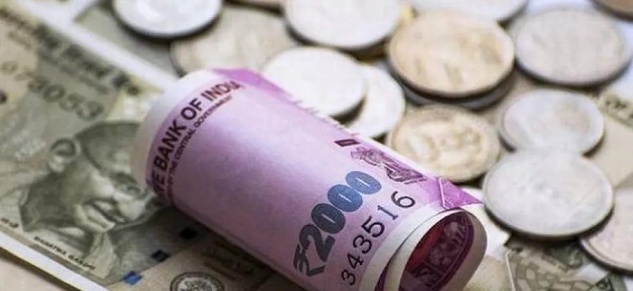 Rupee gains 10 paise to end at 65.11 against dollar