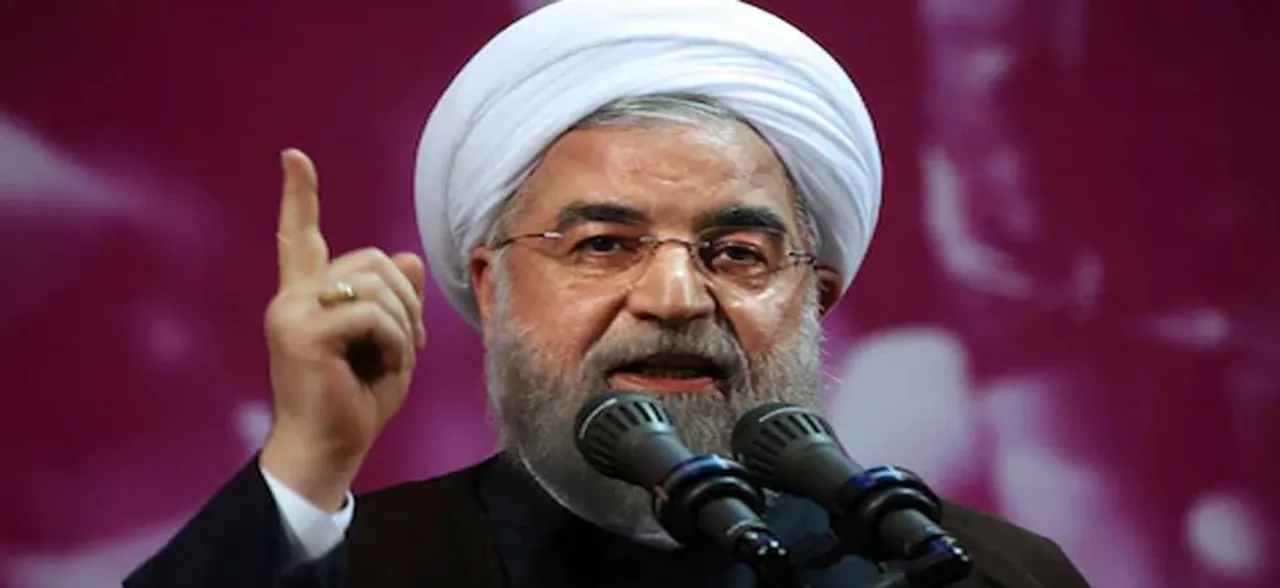 Iran president warns of 'problems' as Trump decision looms