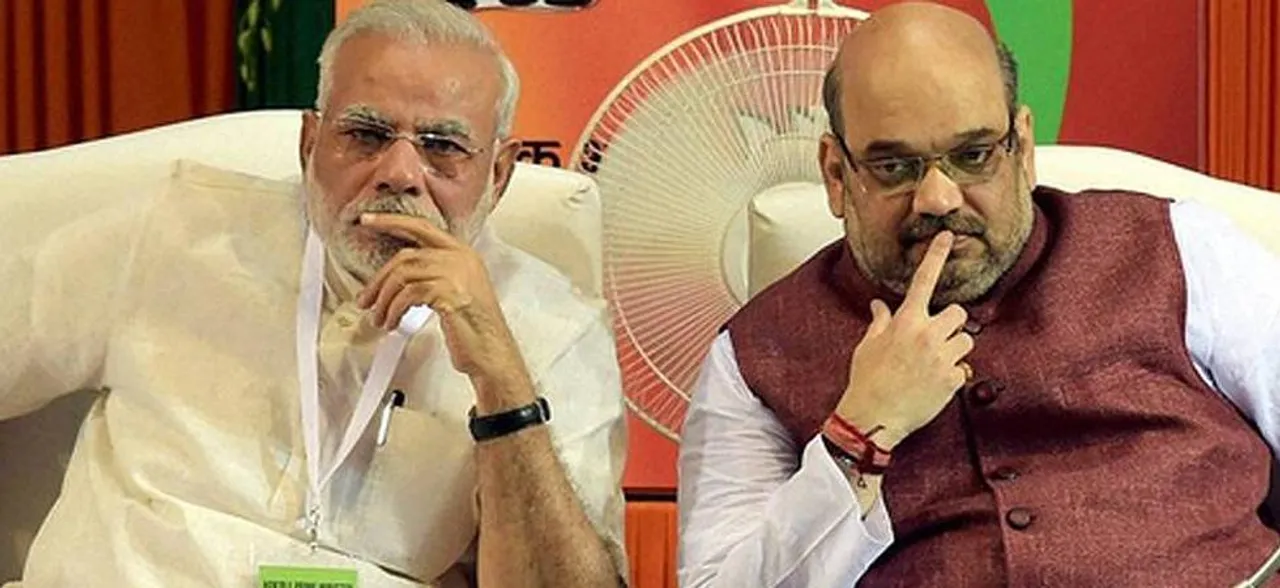 Where were PM Modi and Amit Shah when BS Yeddyurappa was sworn in?