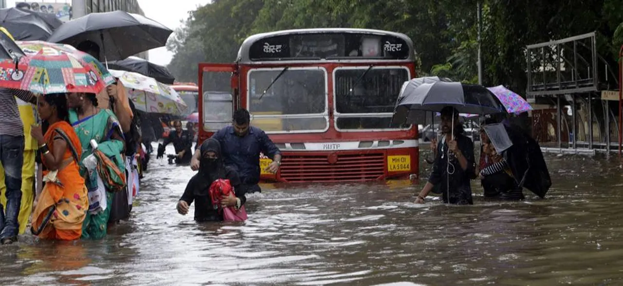 Monsoon hits Mumbai, flights delayed, trains running late due to heavy rains