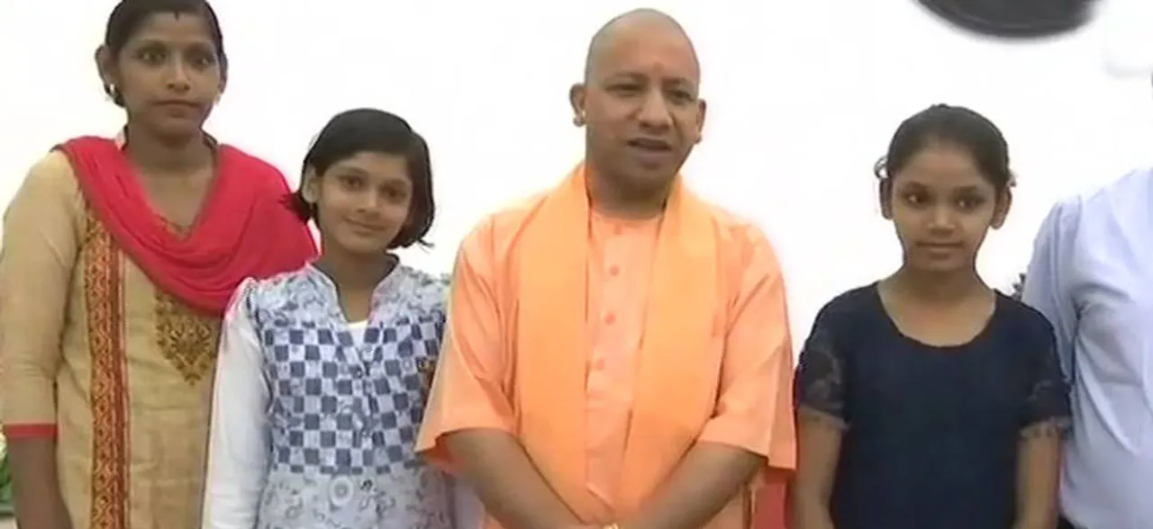 UP CM Yogi Adityanath meets India's 'memory machines' Singh sisters