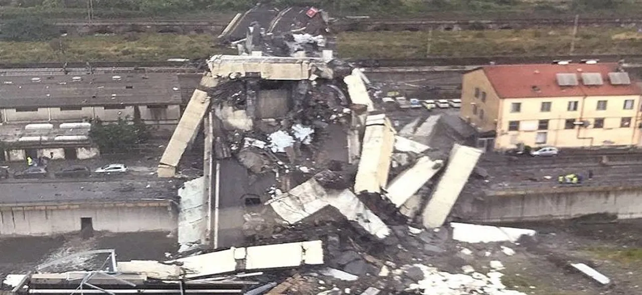 Bridge collapses in Italy during heavy storm, crushing cars