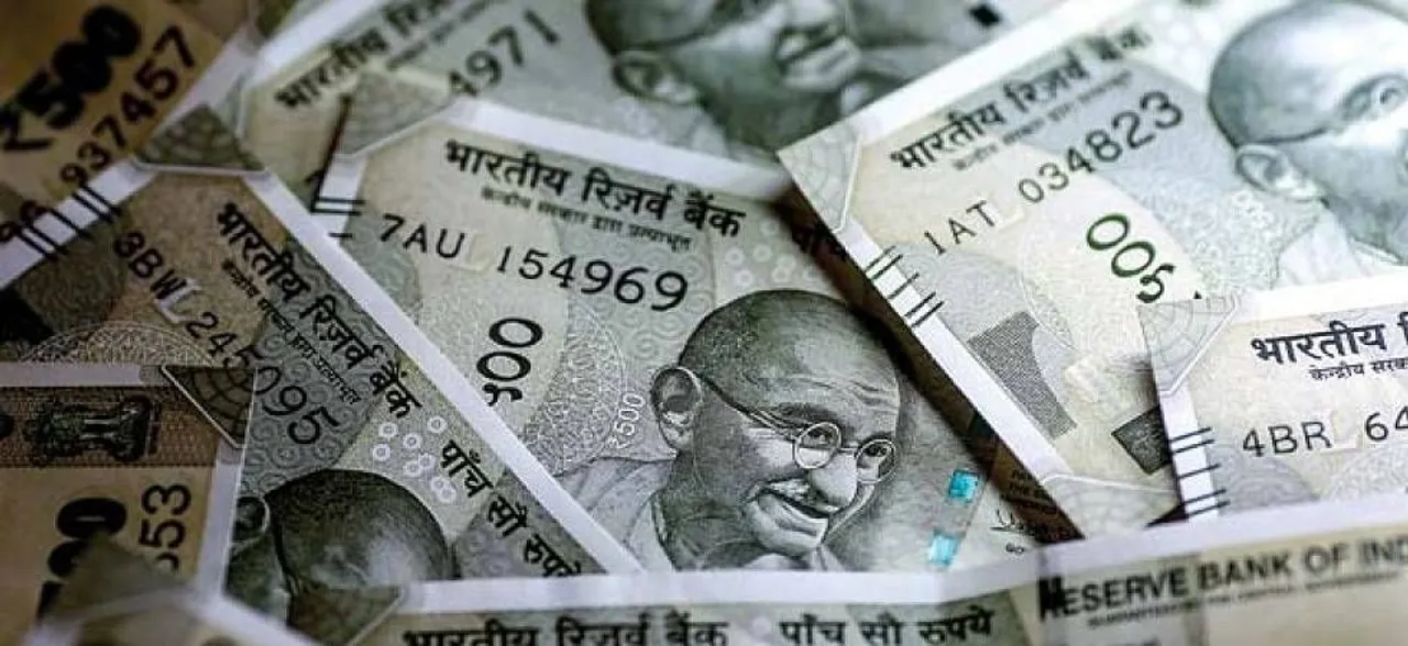 Rupee firms up by 24 paise to 71.75 against dollar in morning trade