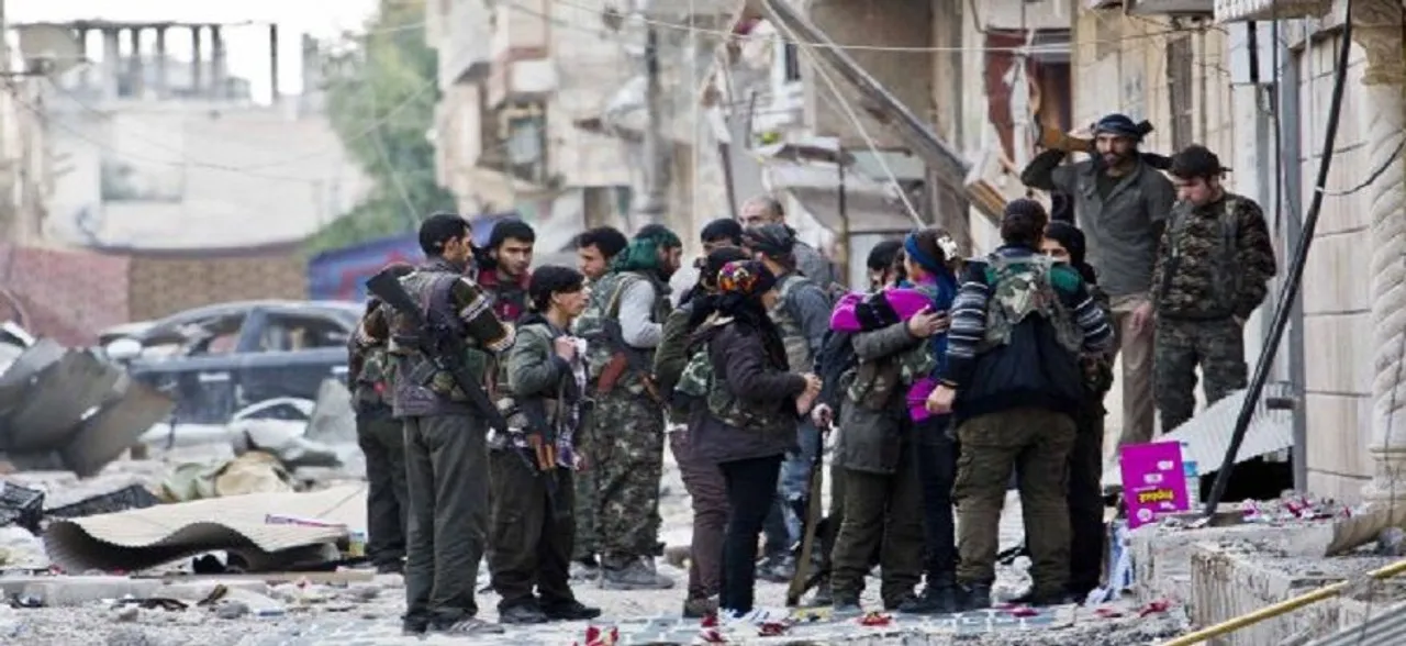 18 dead as Syria Kurds clash with regime forces