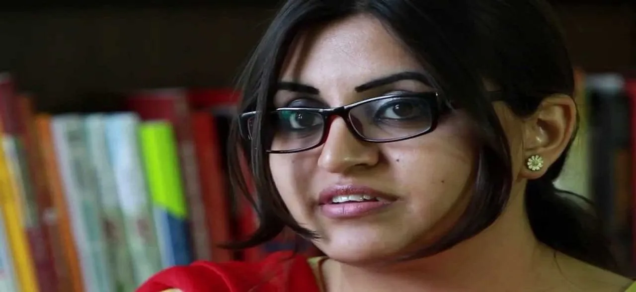 Award-winning rights activist detained as she returns to Pakistan