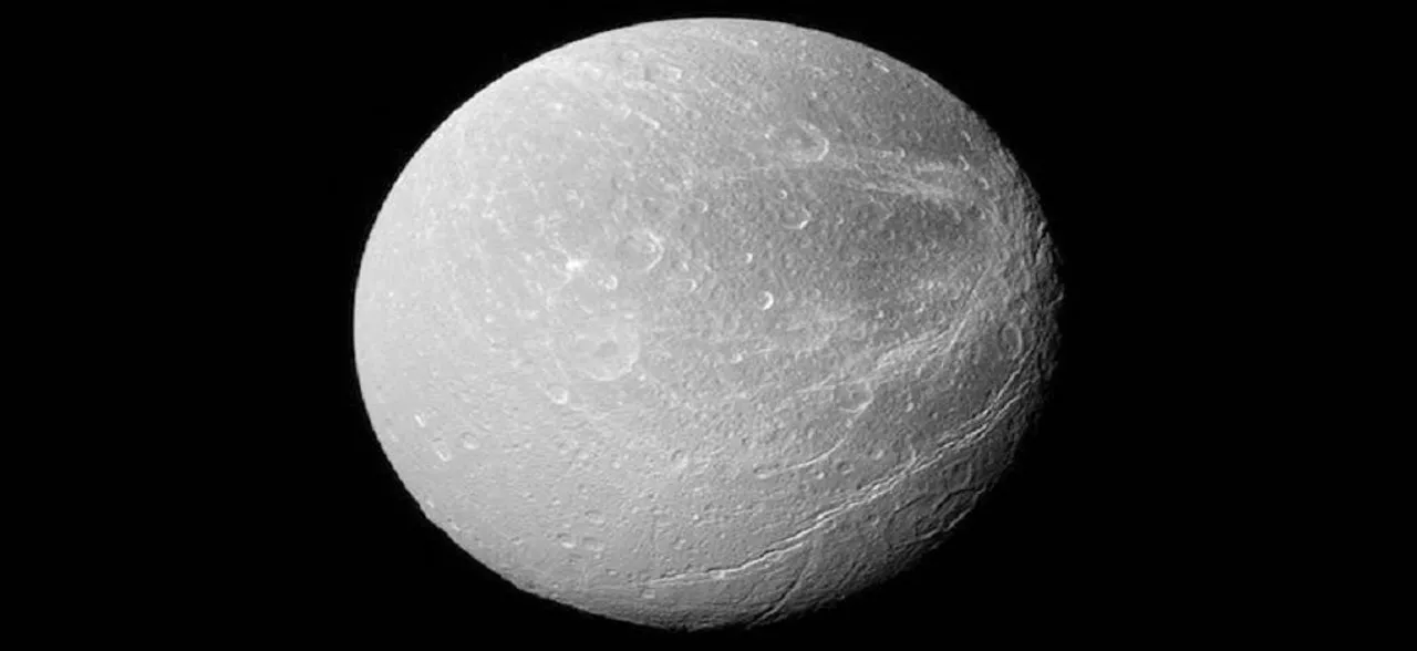 Mysterious bright stripes cover Saturnâ€™s moon Dione, scientists discover