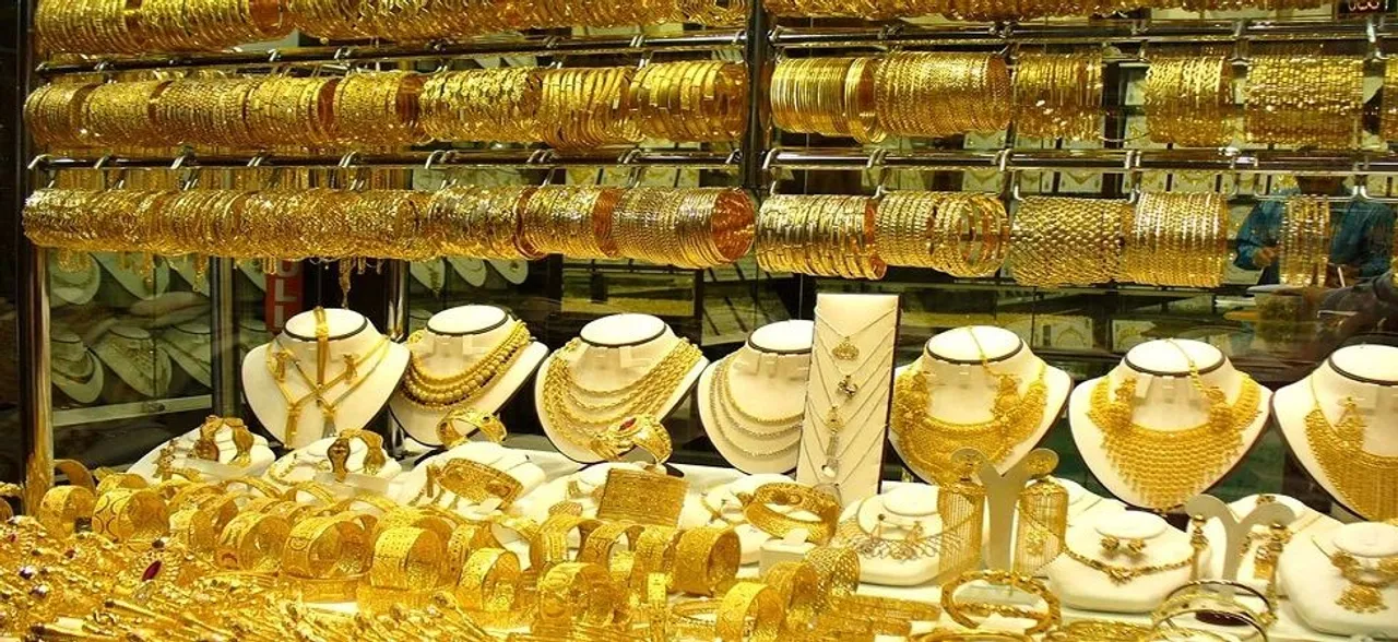 Gold prices up on festive season buying, global cues