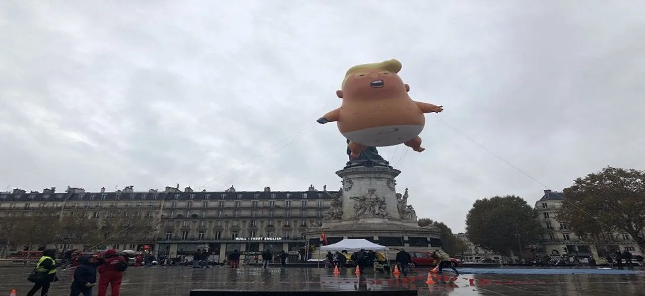 Topless protesters held in bid to â€˜welcomeâ€™ Trump to Paris