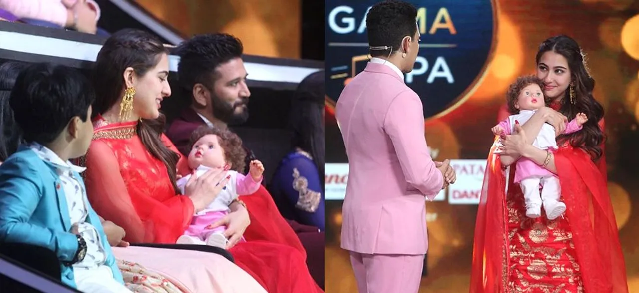 Sara Ali Khan cuddle up with Taimur Ali Khan! Oh wait! It's a Taimur doll