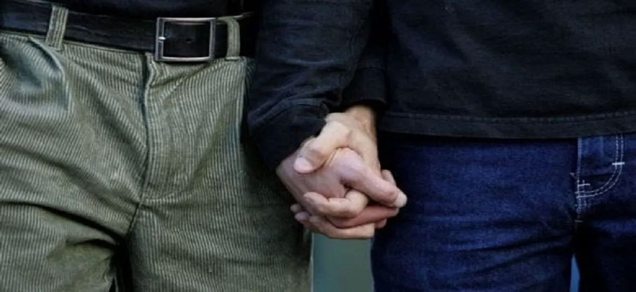 Gay Singapore doctor wins right to adopt surrogate child