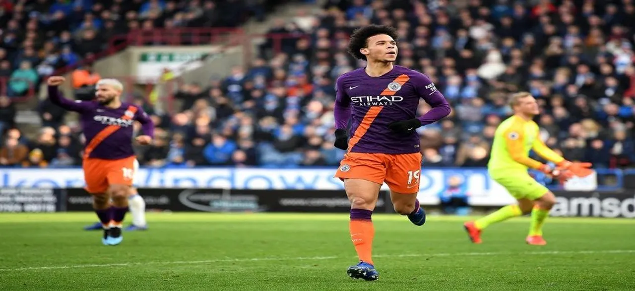 Manchester City cut Liverpool's lead in Premier League, beat Huddersfield Town