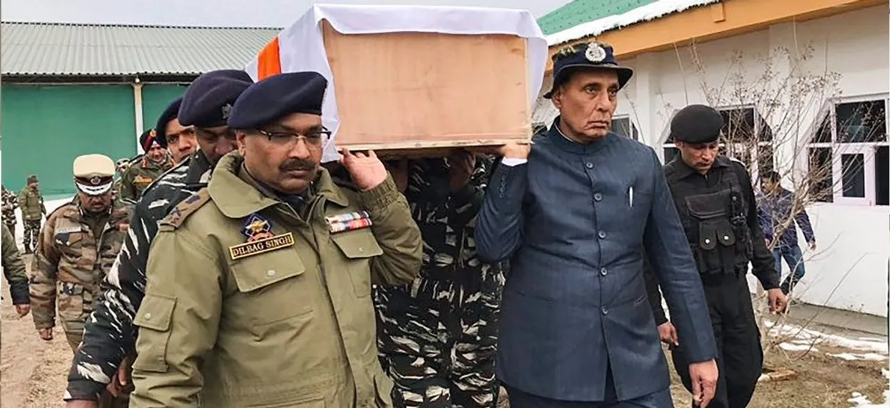 Home Minister Rajnath Singh helps carry coffin of jawan killed in Pulwama terror attack