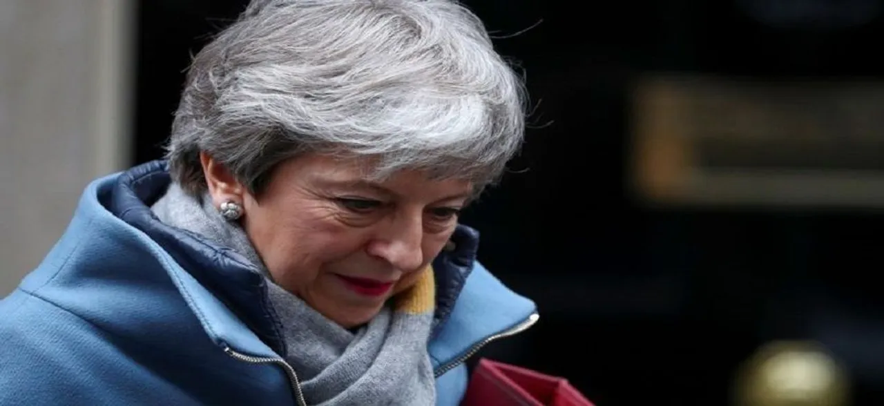 Theresa May seeks Merkel, Macron support for Brexit delay