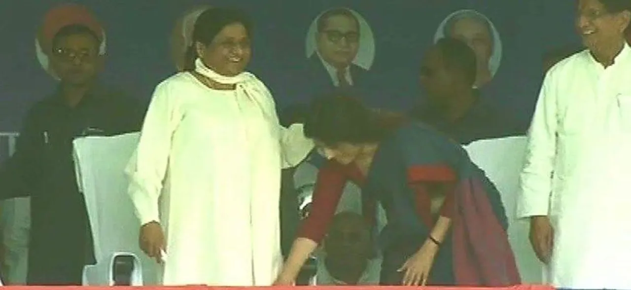 Watch: Dimple Yadav touches Mayawatiâ€™s feet at SP-BSP joint rally in Kannauj