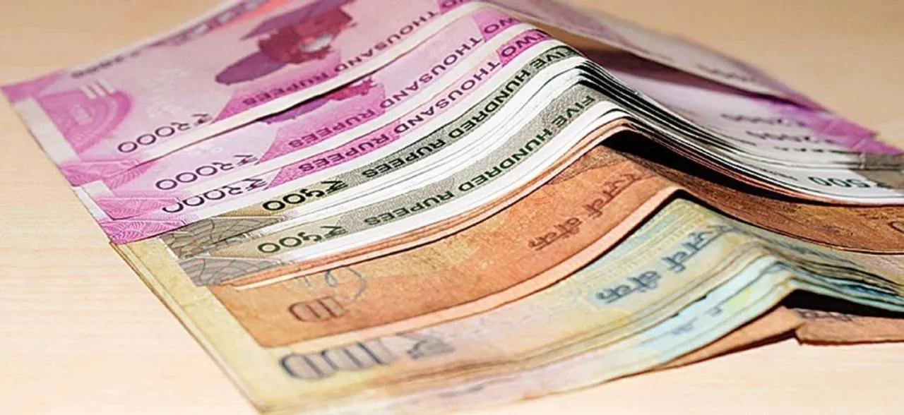Rupee rises 23 paise to 70.02 against US Dollar