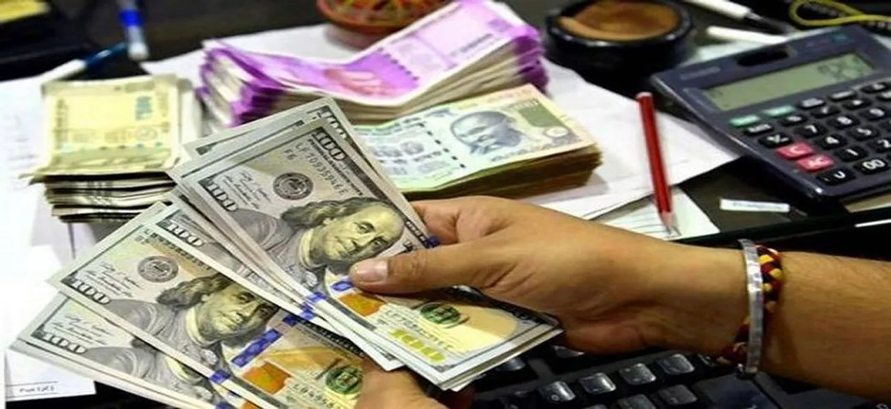 Rupee rises 32 paise to 69.70 against US dollar in early trade amid easing crude prices
