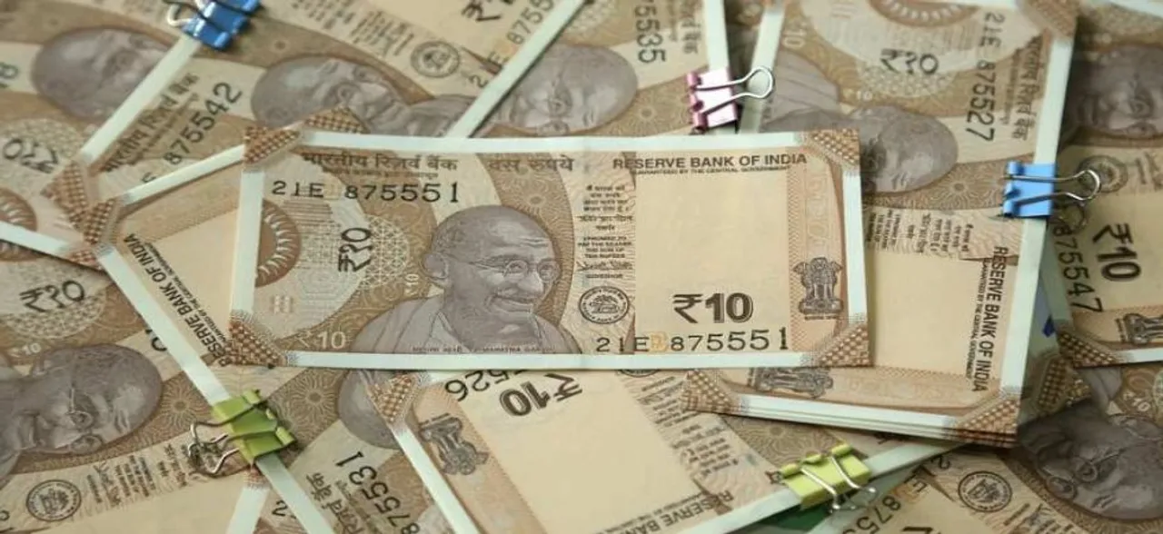 Rupee snaps 4-day losing streak; inches up 2 paise to 69.92 against US Dollar