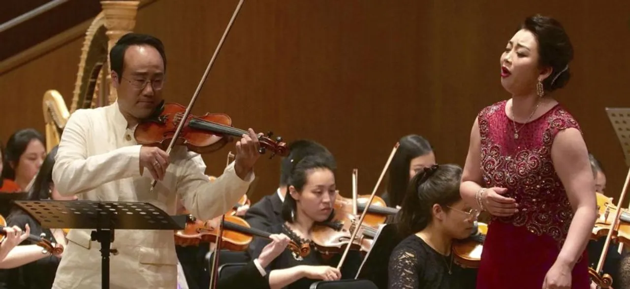 North, South Korean musicians perform together in China to promote peace