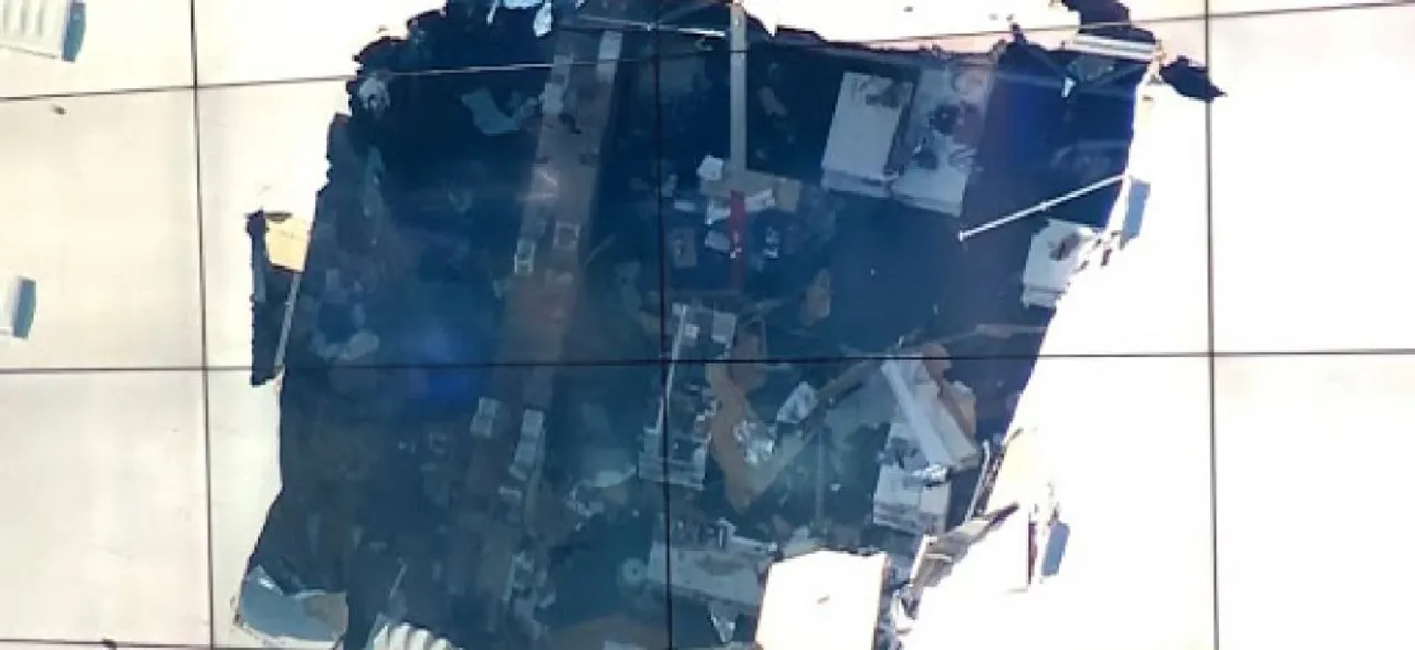 F-16 fighter plane crashes into California warehouse, pilot ejects safely