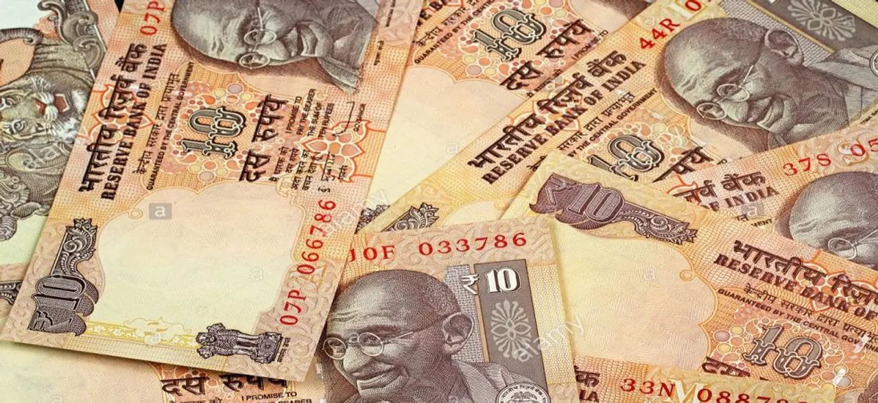 Rupee slips 19 paise to 69.45 against US Dollar ahead of RBI policy outcome