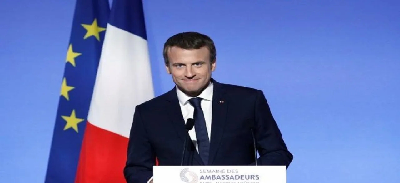 France's Macron backs Merkel for EU post - if she wants it