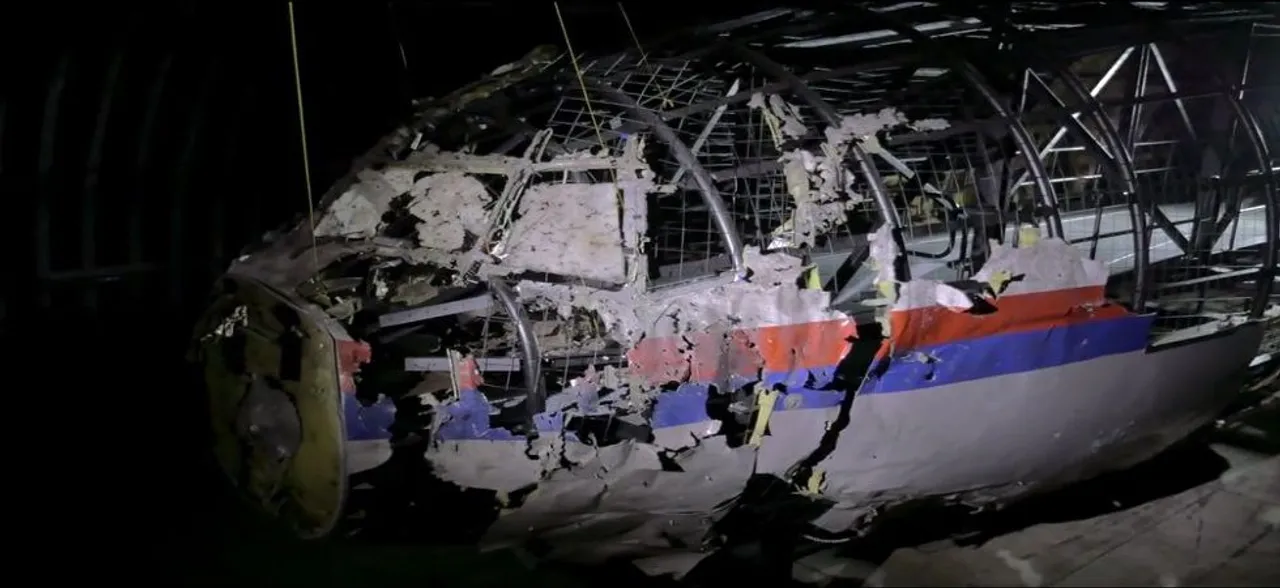MH17 downing: Four men charged with murder after plane shot down over Ukraine in 2014 